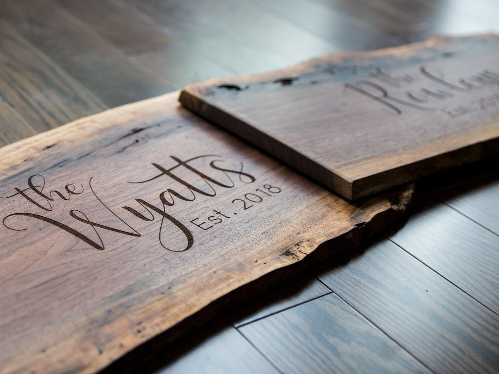 Live edge and wood grain detail on a custom cottage sign