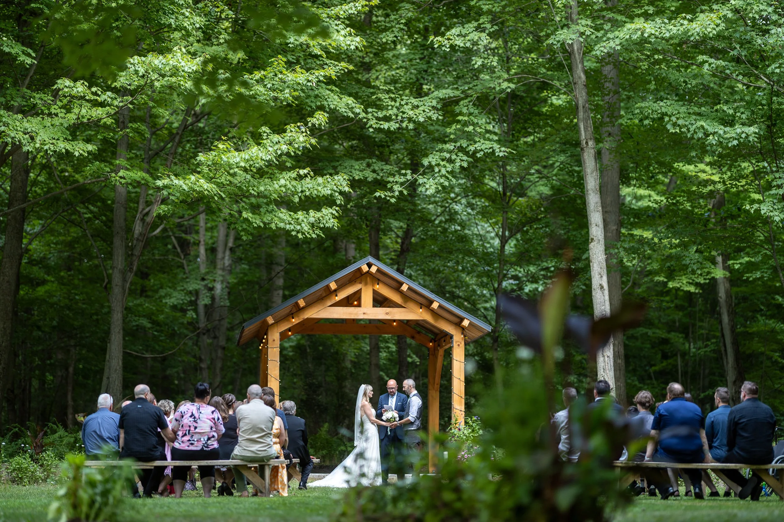 Couple in the forest at Fernwood Hills elopement near London Ontario